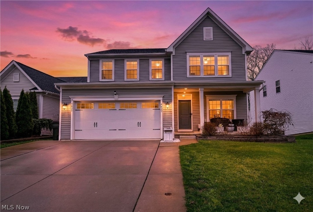 Two-story colonial at dusk at 4627 Pebble Creek Ct, Peninsula, Ohio